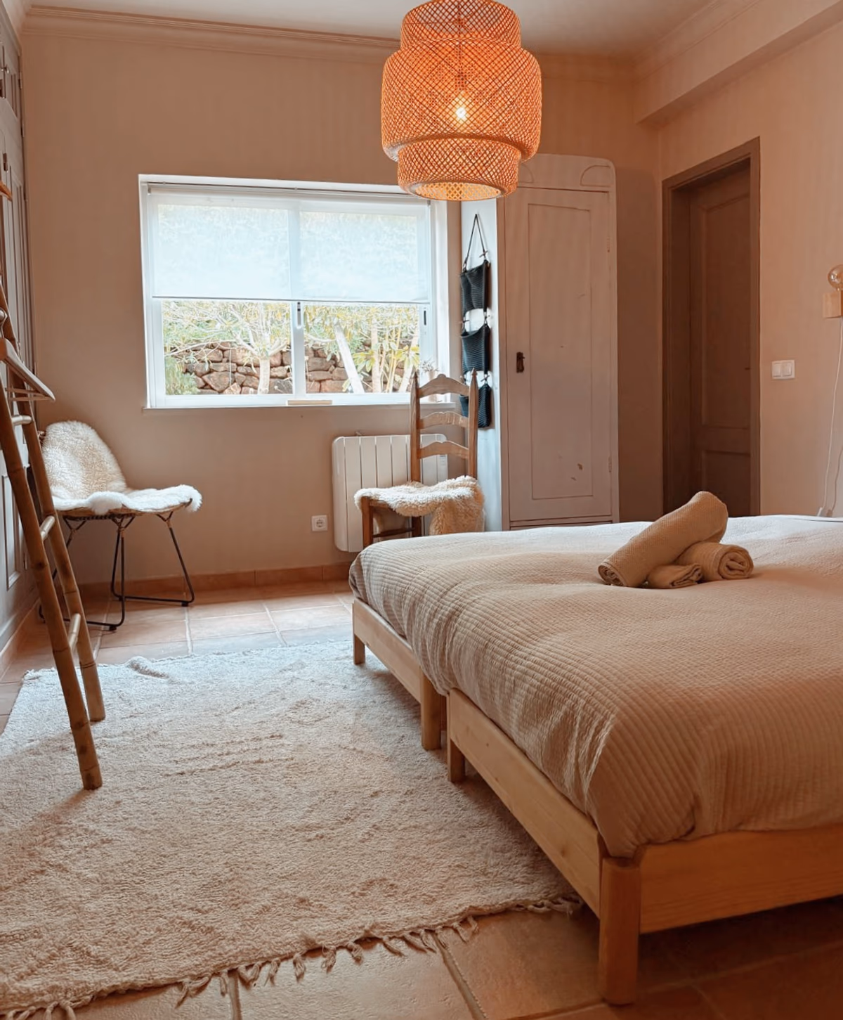 Villa double room at Rose Mountain - warm light, rattan lamp and double bed