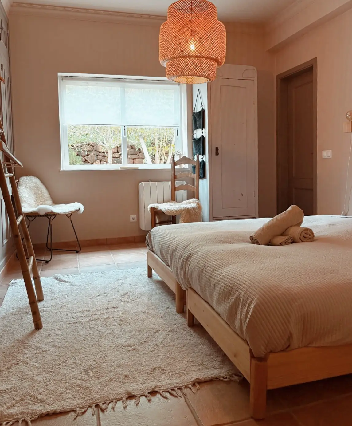 Villa double room at Rose Mountain - warm light, rattan lamp and double bed